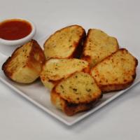 Garlic Bread · 6 pieces of garlic bread and side of marinara sauce.