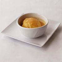 Mashed Potatoes · Freshly prepared mashed potatoes served with chunky chicken gravy.