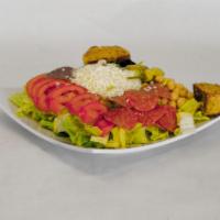 Antipasto Salad · Crispy iceberg lettuce, Salami, Pepperoni, Tomatoes, Bell Peppers, Red Onions, Garbanzo Bean...