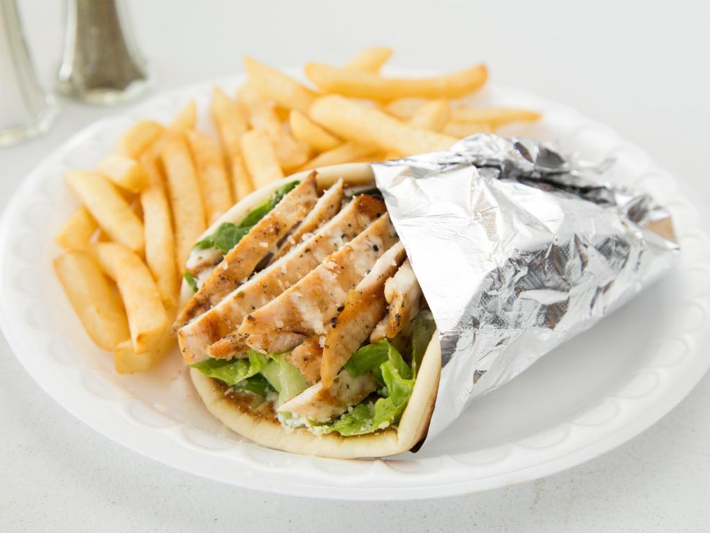 Chicken Caesar Pita · Marinated chicken breast with romaine lettuce, Parmesan cheese and our Caesar dressing. Includes fries or salad.