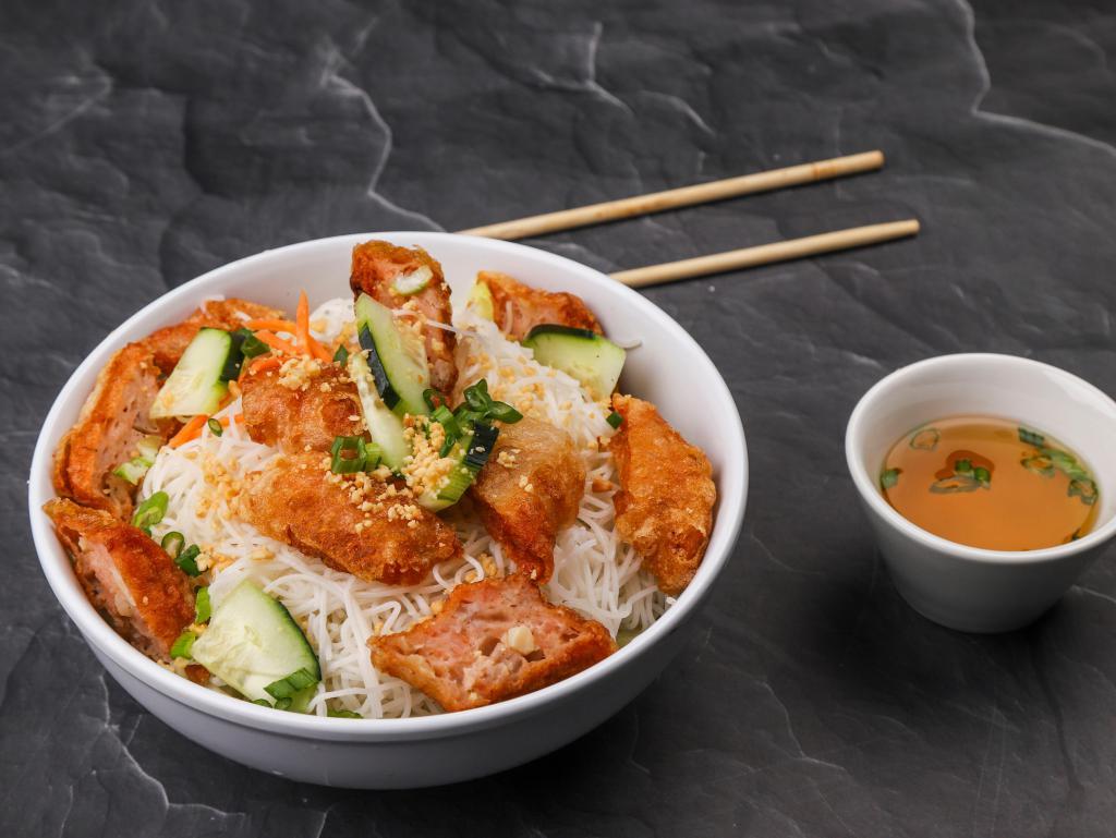 1. Vermicelli with Crispy House Rolls · Served over a bed of lettuce, cucumbers, bean sprouts topped with chopped peanuts and shredded carrots with a side of fish sauce.
