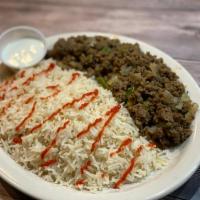 Lamb gyro over rice · Minced Marinated lamb served over a bed of basmati white rice, topped with sautéed onion and...