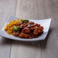 C22. Orange Chicken · Served with fried rice or white rice and vegetable egg roll. Hot and spicy.