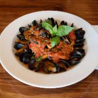 Mussels Marinara · Prince Edward mussels in a rich marinara sauce. Served with bread.