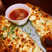 Cheese Bread · Served with our house made marinara for dipping.