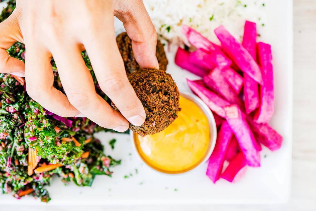 7. Falafel Veggie Plate · 3 falafels (gluten-free) drizzled with tahini, served with rice, grilled vegetables and choice of mixed green salad, tabbouleh-quinoa or kale salad. Vegetarian.