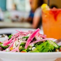 Mediterranean Salad · Romaine lettuce, cucumbers, tomatoes, red onions, Kalamata olives and garbanzo beans topped ...