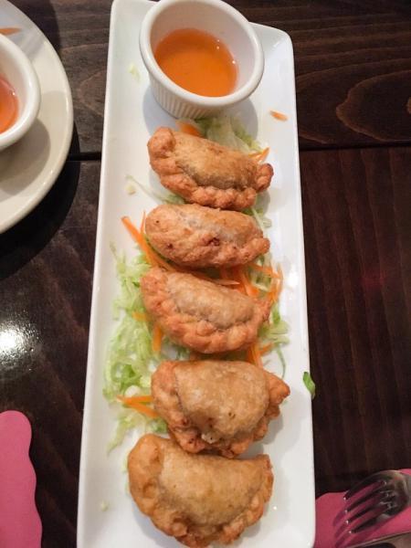 Thai Curry Puff · Pastry puff stuffed with minced chicken, onions, potatoes and curry powder. Served with sweet plum sauce.