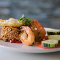 Nasi Goreng · Indonesian fried rice. Fried rice, eggs, scallions, onion, bell pepper, tomato, and spices. ...