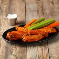 Chicken Wings · 6 or 12 of our delicious wings in our hot and spicy sauce. Served with a side of blue cheese...