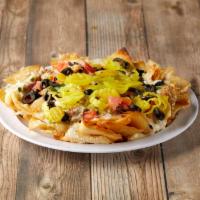 Italian Nachos · Mounds of Italian pasta chips drizzled with asiago cream sauce, loaded with Italian sausage,...