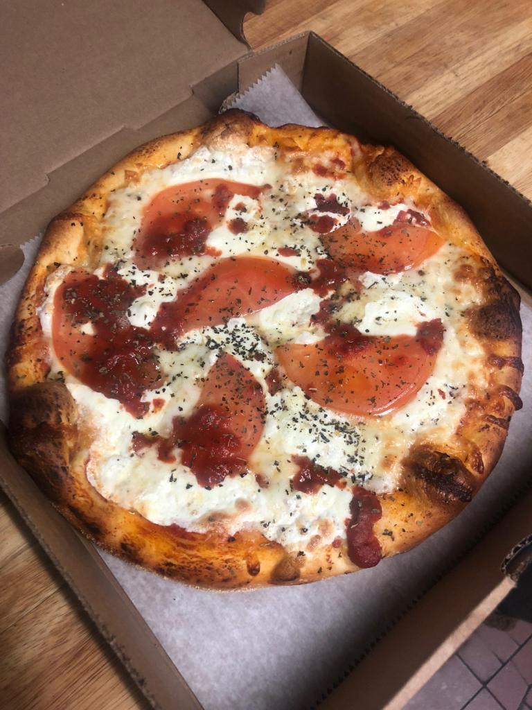 Small Margherita Pizza · Fresh Mozzarella, Sliced Tomato and Basil