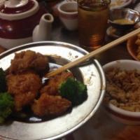 General Tso's Chicken · Marinated chicken chunks, deep fried and sauteed with chef's special hot pepper, garlic flav...