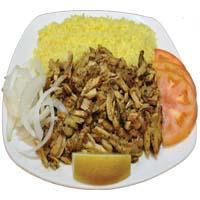 CHICKEN SHAWARMA PLATE · Seared bits of Marinated of chicken thighs, served with rice, pita bread, tomatoes, onions a...