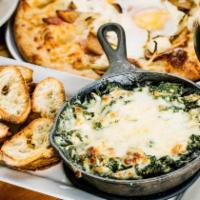 Spinach Artichoke Dip · Skillet baked cream cheese dip with fresh saute’ spinach & artichoke hearts. 
 Topped with ...