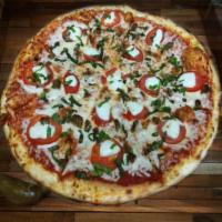 Cheese and Chong Pizza · Classic house made red sauce with fresh mozzarella cheese, sliced Roma tomatoes, fresh Buffa...