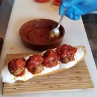 Meatball Panini · Mozzarella cheese, meatballs, tomato sauce.