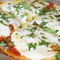 Margherita Pizza · Mozzarella, tomato and basil.
