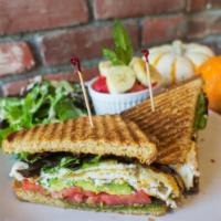 Energy Sandwich All Day Breakfast · Toasted wheat bread, egg whites, tomatoes, avocado and basil pesto and served with a side of...