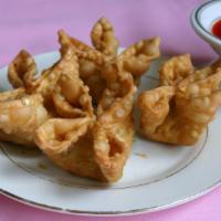 A11. Four Piece Crab Meat Rangoon · Crab meat with cream cheese wrapped in wonton skin.