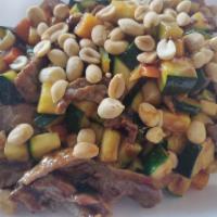 7. Kung Pao Beef · Beef stir-fried with zucchini, carrots, bamboo shoots, water chestnut in spicy brown sauce, ...