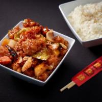 33. General Tso's Chicken · Tender, crispy chicken with broccoli, bell peppers, onion, and pineapple stir fried in a spi...