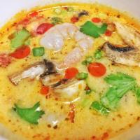 Tom Kha Soup · Coconut soup with straw mushroom, galangal root, citrus leaves and fresh lime juice. 