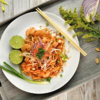 Pad Thai  · Stir fried thin rice noodles with green onions, bean sprouts, egg and crushed peanut in tama...