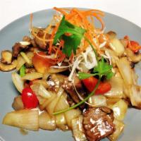 Mongolian Beef · Stir fried tender beef with bell peppers, tomatoes, mushrooms and onions in a special oyster...