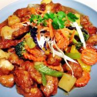 Sweet and Sour Chicken · Crisp battered chicken, pineapple, peapods, bell peppers and mushroom in house special sweet...