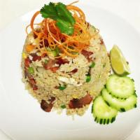 BBQ Pork Fried Rice · Stir fried rice with BBQ pork, egg, carrot, onions and green peas. 