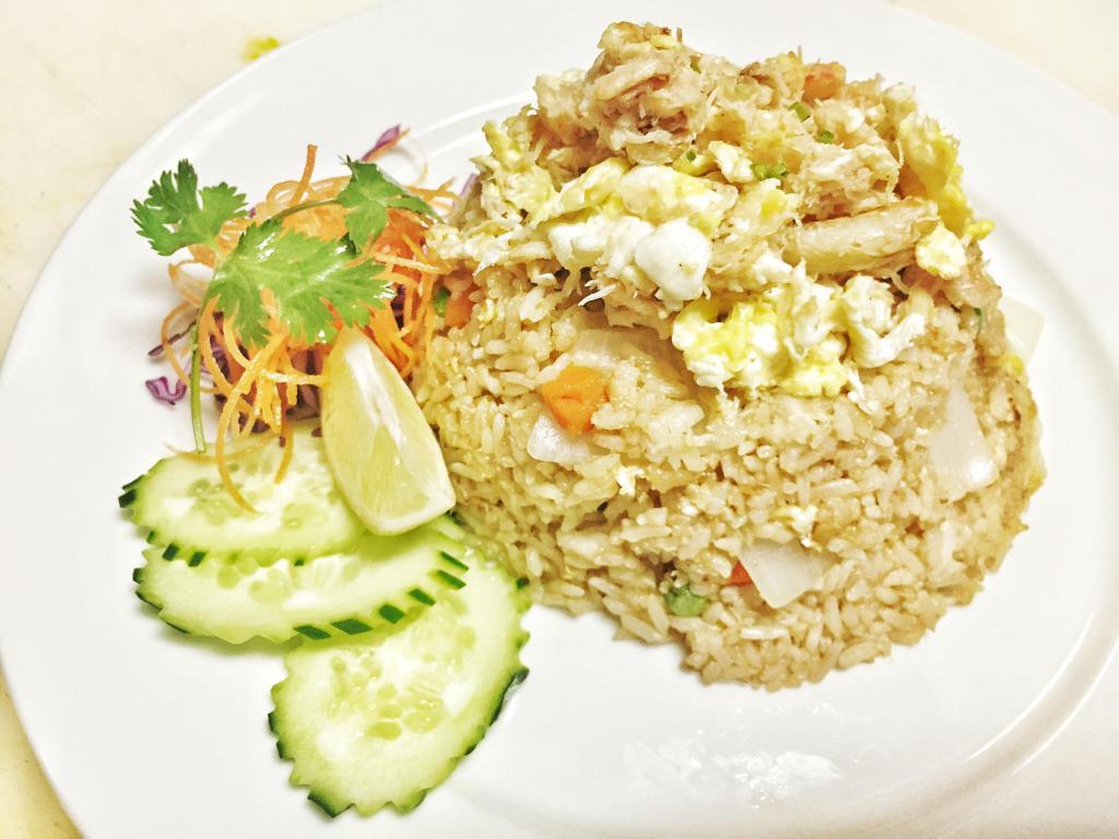 Crabby Fried Rice · Stir fried rice with real crab meat, onion, egg, and bell peppers