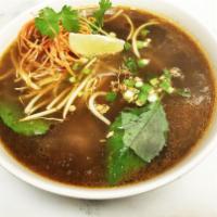 Chicken Noodle Soup  · Sliced chicken or beef noodle soup  with bean sprouts, scallions and basil leaves. 
