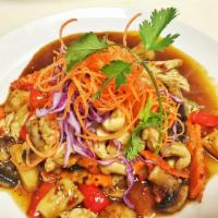 Cashew Rice Dish · Stir fried cashew nuts with carrots, pineapple, bell peppers, mushroom and peapods. 
