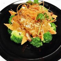 Thai Peanut Rice Dish · Stir fried peanut sauce with broccoli, carrots and bean sprouts. 