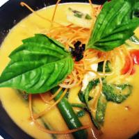 Red Curry Rice Dish · Bamboo shoot, bell peppers, green beans and basil leaves in Thai spicy red curry with coconu...