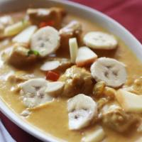 Chicken Kashmiri · Chef’s specialty item prepared in a cream sauce with fresh sliced bananas, dried pineapples,...
