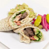 14. Beef Kabob Wrap · Beef, hummus, lettuce, tomato and house dressing. Served with pickled turnips and choice of ...