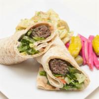 16. Kofta Kabob Wrap · Ground beef,  lettuce, tomato and tahini sauce. Served with pickled turnips and choice of si...