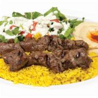 1. Beef Kabob Plate · Served with homemade hummus, rice, house salad, pita bread and famous green sauce.
