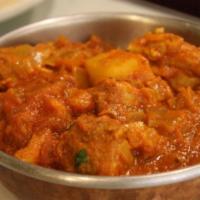 Chicken Vindaloo · Red wine, chopped garlic, potatoes, hot chilis, and spicy Portuguese curry from Goa.