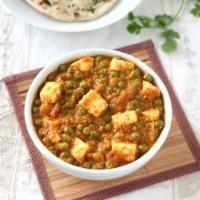 6. Matar Paneer · Homemade cheese cubes with peas cooked in mildly spiced sauce.