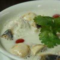 S3. Tom Kha Chicken Soup · Chicken coconut milk soup with mushroom, red onion and galangal. Spicy.