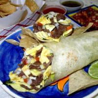 Breakfast Burrito · Scrambled eggs, salsa fresca, cheese, and potatoes with choice of meat