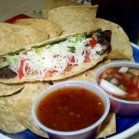 Hard Taco · Choice of meat in a crispy corn tortilla.