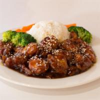 Sesame Chicken · Crispy, fresh chicken breast cubed and marinated in sesame sauce, topped with crunchy sesame...