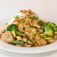 Cashew and Veggie Delight · Crunchy cashews topped on mixed veggies stir-fried with homemade brown sauce: choice of prot...