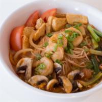 Tom Yum Noodle Soup · The most famous Thai spicy & sour soup! Refreshing ingredients: Lemon grass, fresh Thai chil...
