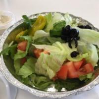Garden Salad · Lettuce, tomatoes, black olives and red onions.