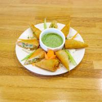 Vegetable Spring Rolls (4) · Indian style Vegetable Spring Rolls - No meat and No Egg. Served with a side of manchurian s...
